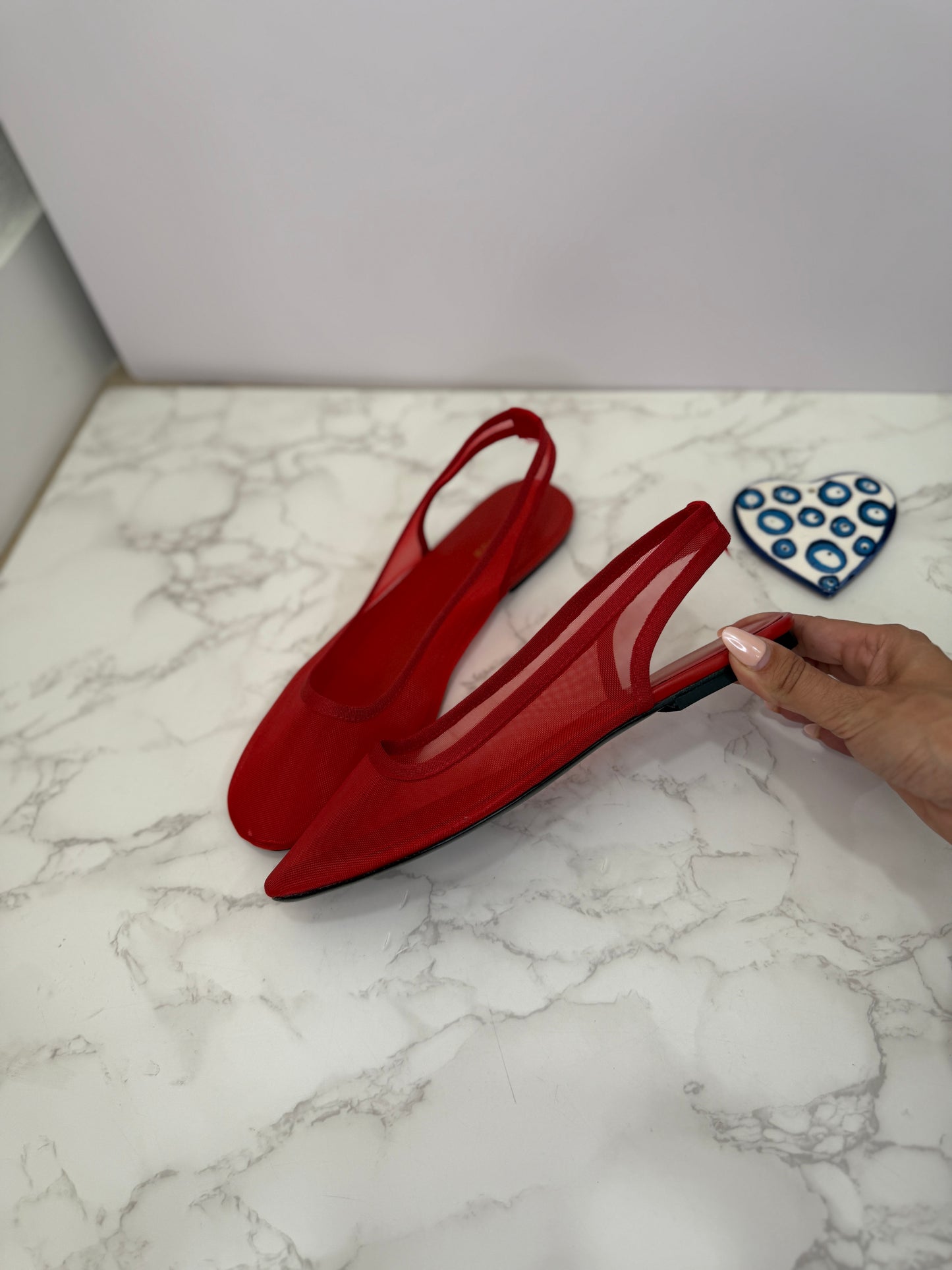 Row mesh slingbacks