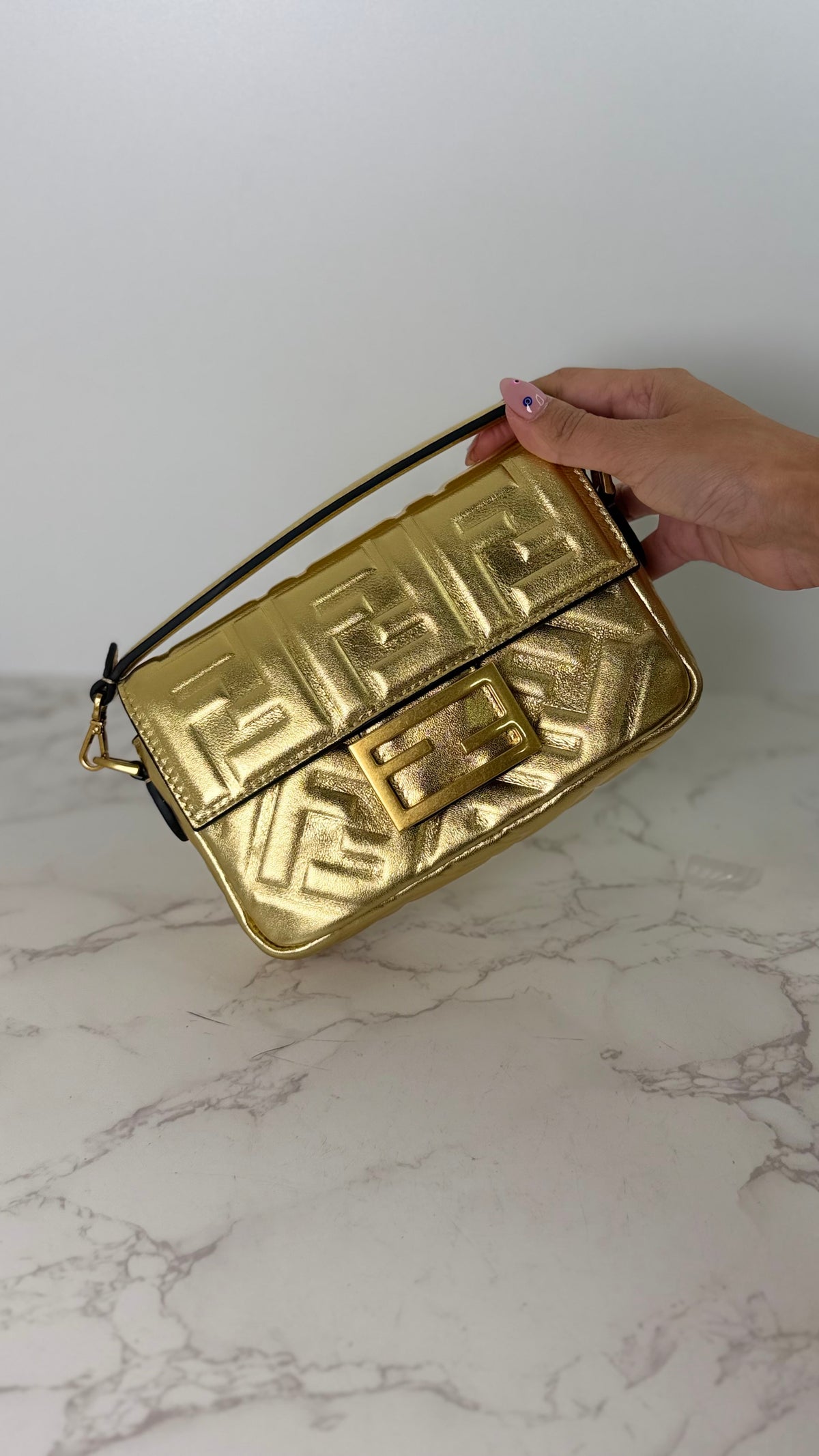 Fendi gold baguette