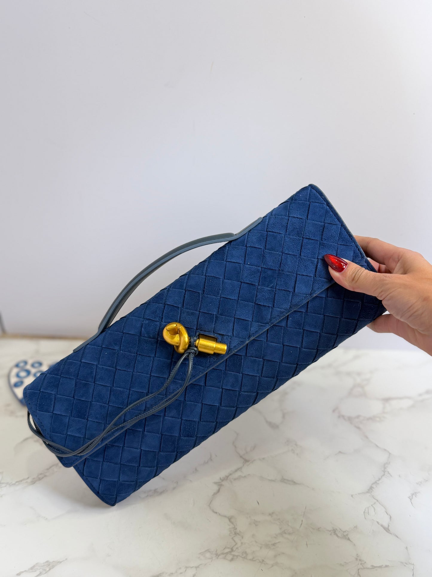 Blue suede andiamo clutch