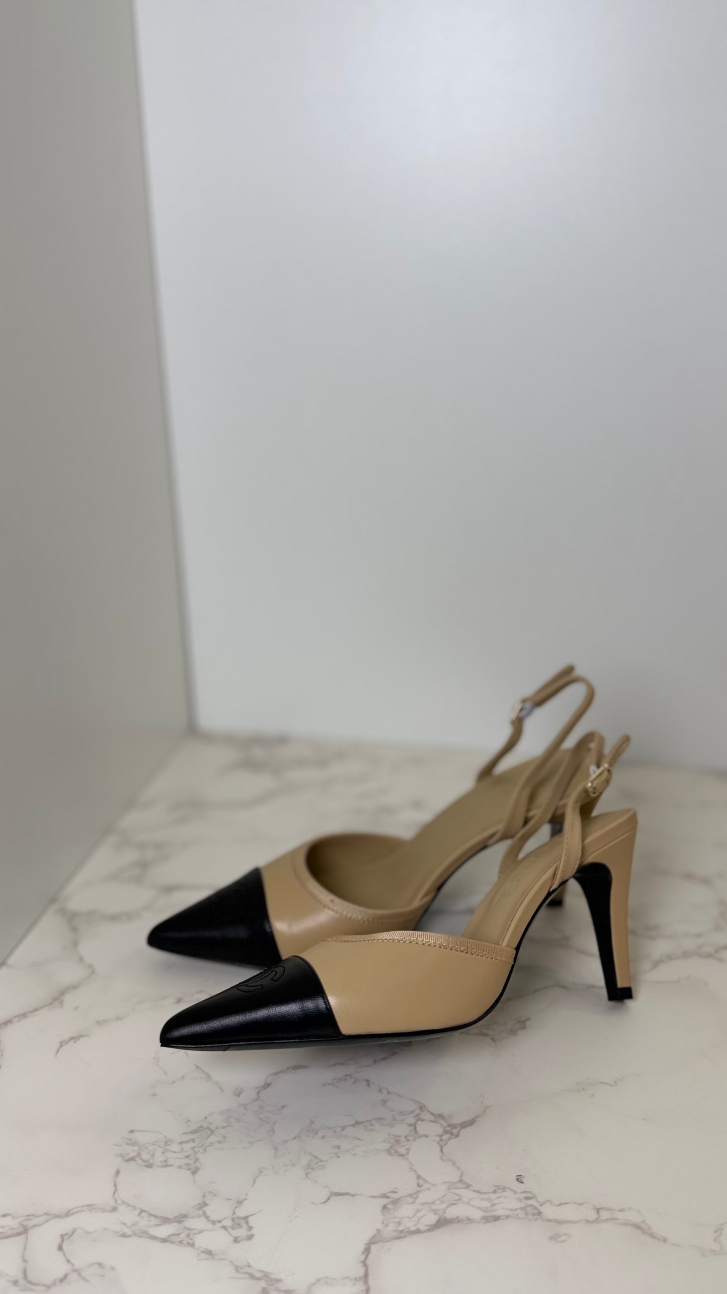 CC pointed toe slingbacks 26
