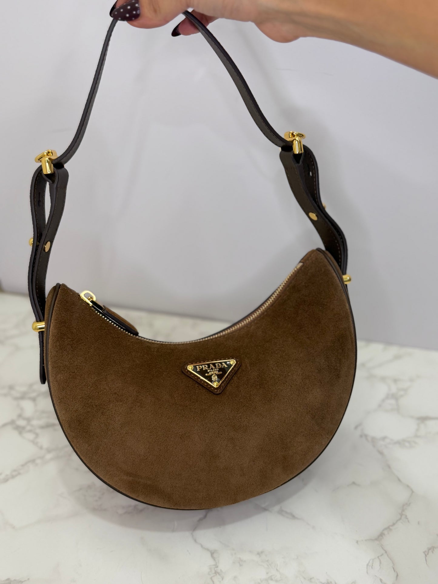 Prada suede half moon shoulder