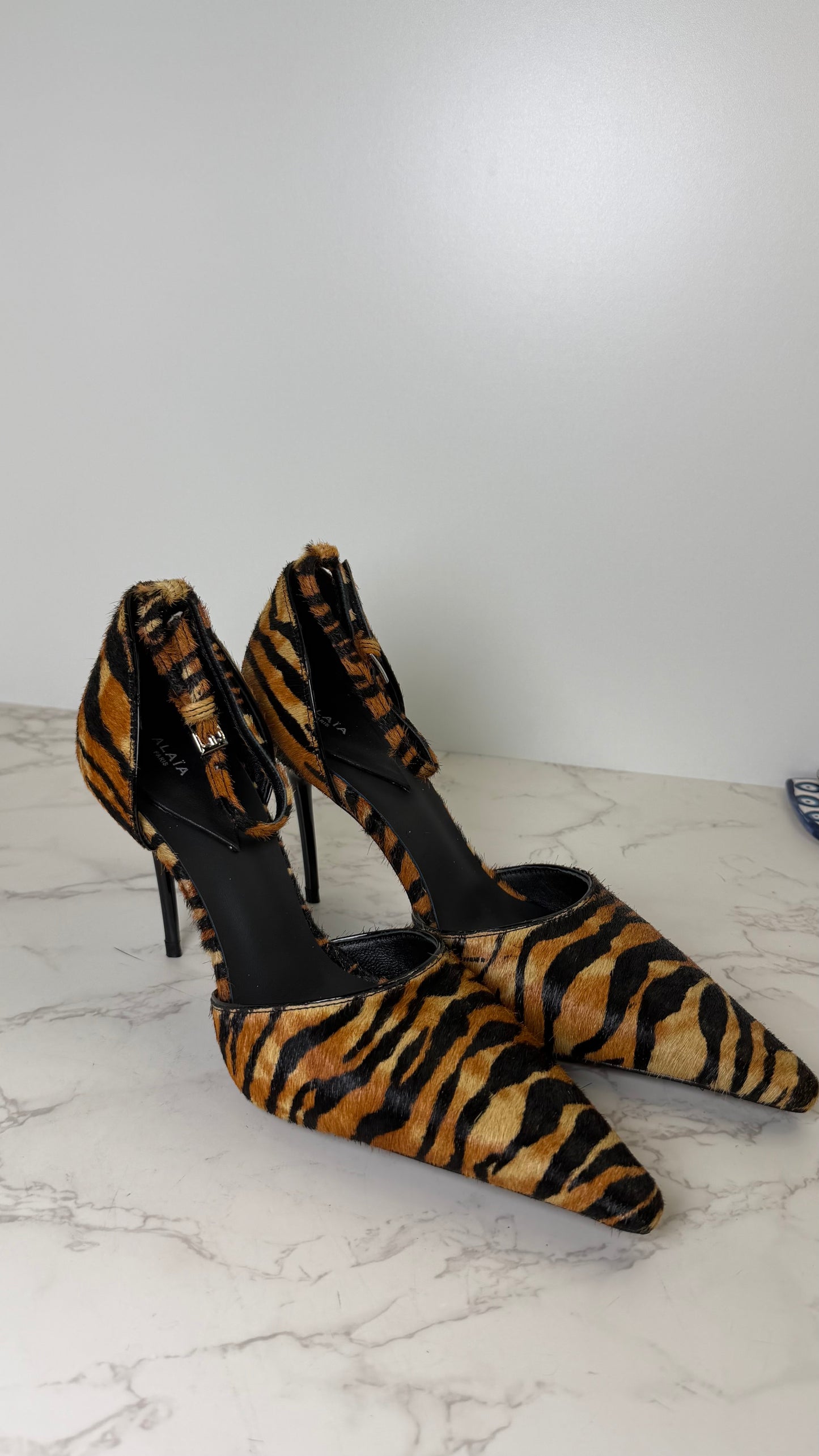AlAIA pony hair pointed toe