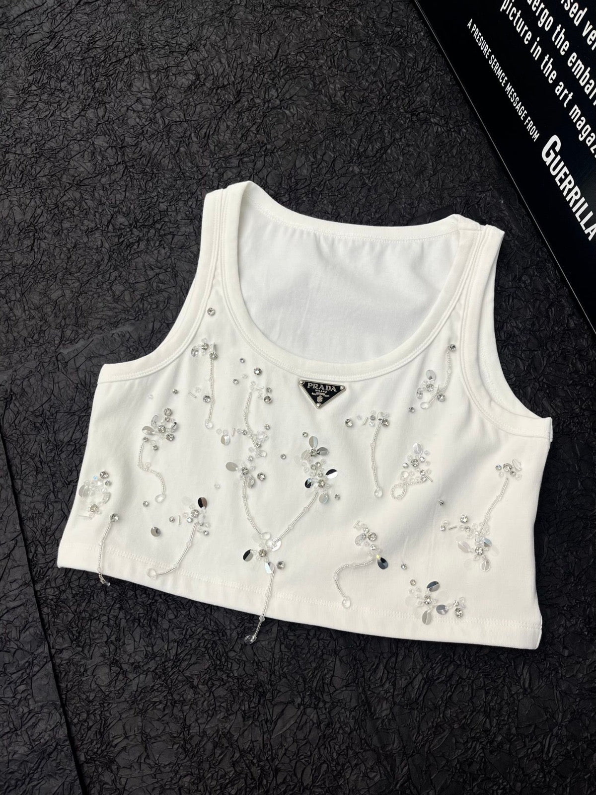 Embellished tank