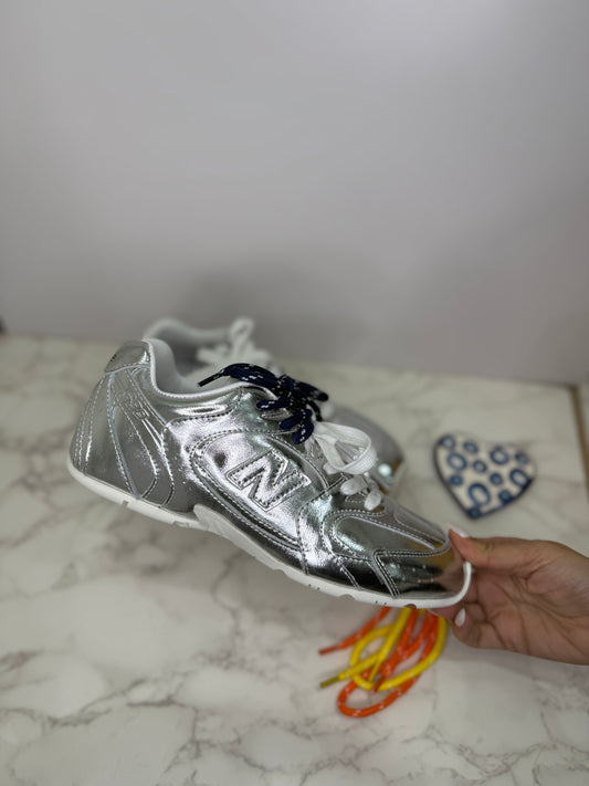 Metallic new balances