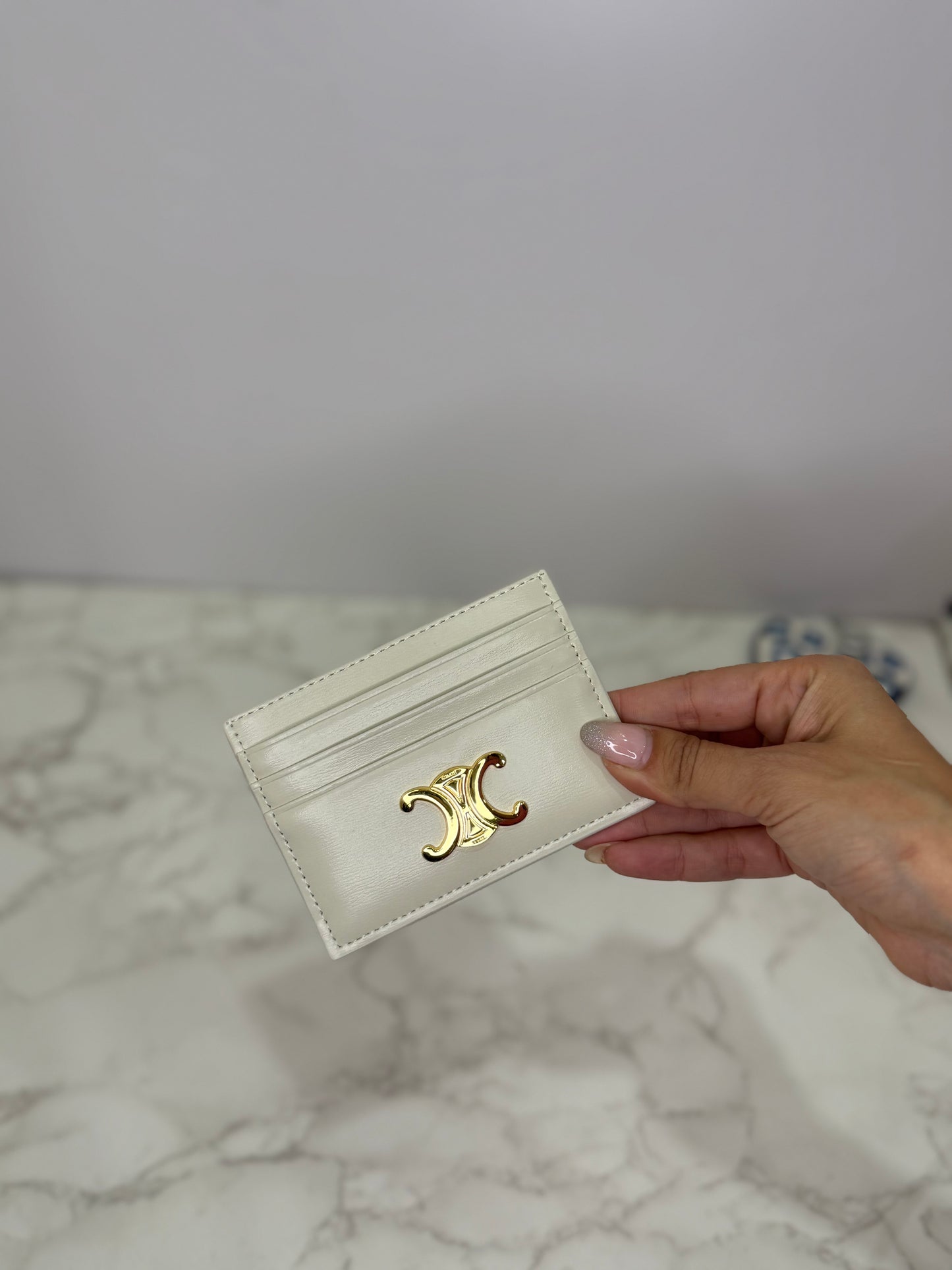 Triomphe card holder