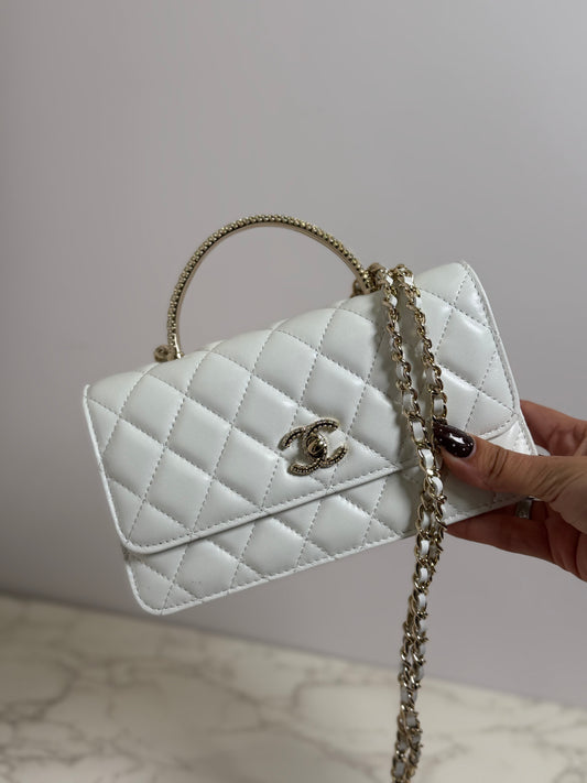 Embellished cc wallet on plane